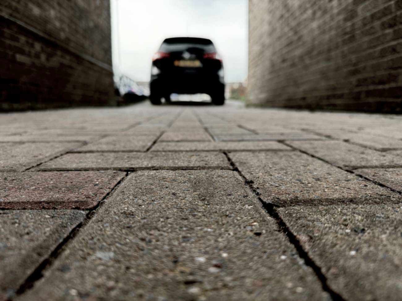 a car driving on a driveway