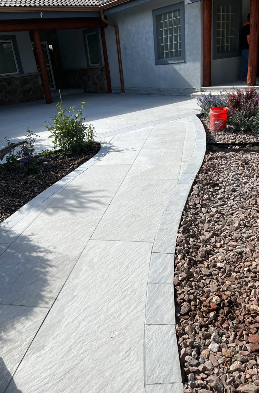 beautiful concrete walkway created by Blue Sky Hardscape