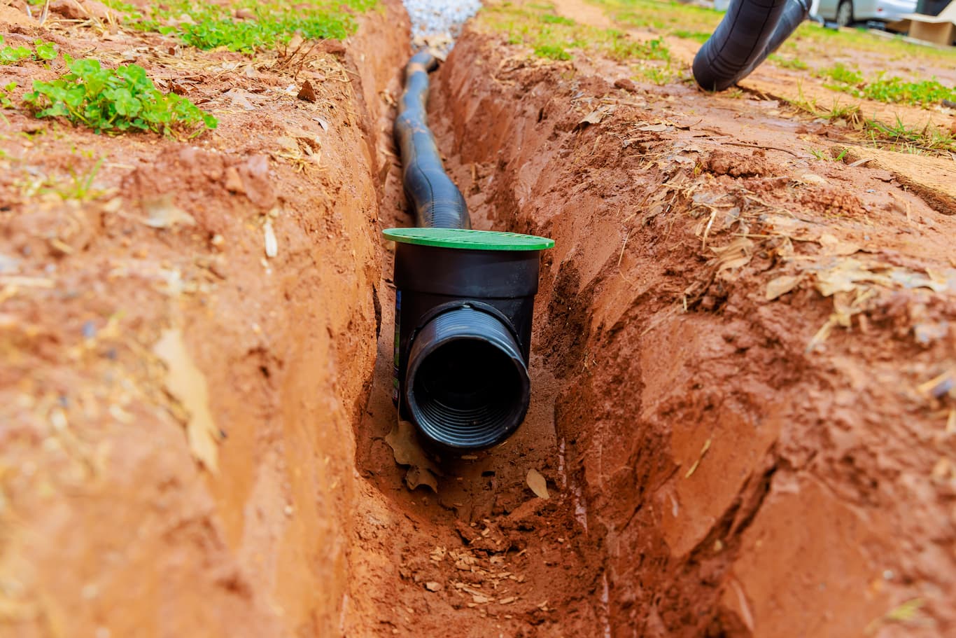 drainage system with pop-up emitter